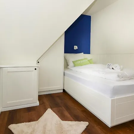 Holiday home Farnweg 7 Whg B Mittelhaus Sudstrand